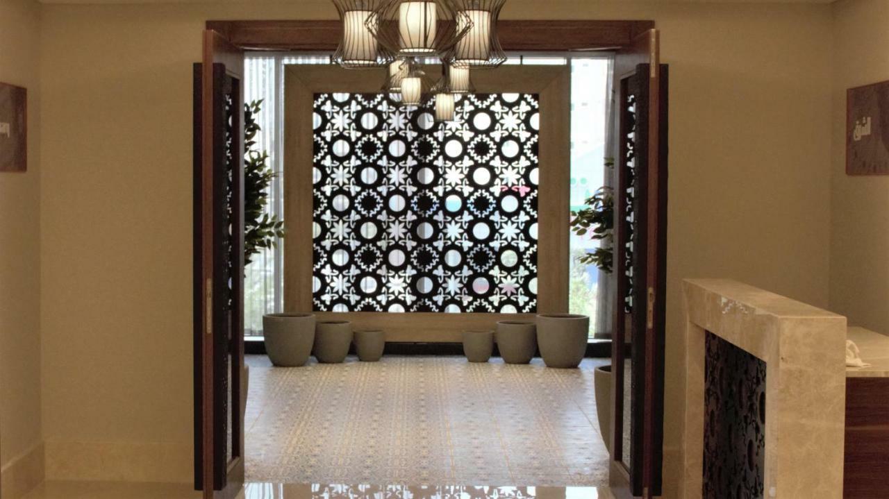 Park Inn By Radisson Makkah Aziziyah La Mecque Extérieur photo A decorative panel of glass